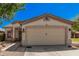 This single-Gathering home boasts a two-car garage and low-maintenance desert landscaping at 30259 N Sunray Dr, San Tan Valley, AZ 85143