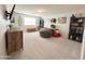 Versatile bonus room with carpet, natural light, and plenty of space for relaxing at 322 S Soledad Ct, Casa Grande, AZ 85194