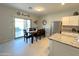 Dining area with sliding door access to the backyard patio at 322 S Soledad Ct, Casa Grande, AZ 85194