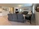Cozy living room with comfortable seating arrangements and abundant natural light at 322 S Soledad Ct, Casa Grande, AZ 85194