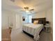 Comfortable bedroom features natural lighting, with stylish furnishings for a relaxing space at 322 S Soledad Ct, Casa Grande, AZ 85194