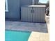 The poolside shows a new storage unit for storing pool equipment at 322 S Soledad Ct, Casa Grande, AZ 85194