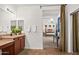 Bright bathroom with dual sink vanity, large mirror and view to adjacent bedroom at 4221 S Fireside Ct, Gilbert, AZ 85297