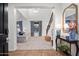 Inviting home foyer leading to a spacious living room with elegant decor and plenty of light at 4221 S Fireside Ct, Gilbert, AZ 85297