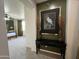 Hallway with decor leading to bedroom with four-poster bed at 4221 S Fireside Ct, Gilbert, AZ 85297