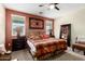 Nicely appointed bedroom featuring a modern ceiling fan and a neutral color scheme at 42519 W Centennial Ct, Maricopa, AZ 85138