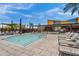 Gorgeous community pool area with ample lounge chairs for relaxation and soaking up the sun at 4360 S Atom --, Mesa, AZ 85212