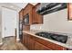 Gourmet kitchen features stainless steel appliances, granite counters, and modern fixtures at 4360 S Atom --, Mesa, AZ 85212