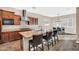 Spacious kitchen featuring a large island, stainless appliances, and views into the dining area at 4360 S Atom --, Mesa, AZ 85212