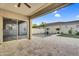 Covered patio leads to a well-maintained backyard, featuring a pool and a lovely outdoor space at 4360 S Atom --, Mesa, AZ 85212