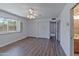 Bright bedroom with ceiling fan, and closet space with laminate floors at 4515 N 35Th St, Phoenix, AZ 85018