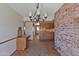 Bright dining area with a unique chandelier next to the kitchen area at 4515 N 35Th St, Phoenix, AZ 85018