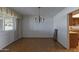 Open concept dining area with a large window and beautiful flooring at 4515 N 35Th St, Phoenix, AZ 85018