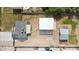 Birds eye view of a property featuring the main home, detached garage and horse stable on a large property at 4602 W Monte Cristo Ave, Glendale, AZ 85306