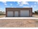 Spacious barn featuring multiple bays, a concrete pad, and ample storage space at 4602 W Monte Cristo Ave, Glendale, AZ 85306