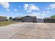 Inviting single-story home with a huge driveway and a two-car garage providing ample parking space at 4602 W Monte Cristo Ave, Glendale, AZ 85306