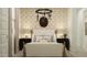 Warm bedroom features a plush bed, rustic decor, accent lighting, and classic nightstands at 4808 S 232Nd Ln, Buckeye, AZ 85326
