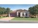 Charming single-story home with a tile roof, two-car garage, and well-maintained landscaping at 4808 S 232Nd Ln, Buckeye, AZ 85326