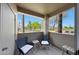 Inviting outdoor balcony featuring comfortable seating with picturesque neighborhood views at 5335 E Shea Blvd # 1087, Scottsdale, AZ 85254