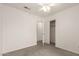 Carpeted bedroom featuring a ceiling fan and closet with sliding doors at 5401 W Jessica Ln, Laveen, AZ 85339