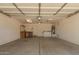 Spacious garage with a washing machine, dryer, and a work area at 5401 W Jessica Ln, Laveen, AZ 85339