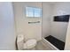 Updated bathroom with walk-in shower, hex tile and bright window at 6419 W Monte Cristo Ave, Glendale, AZ 85306