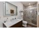 Stylish bathroom showcasing mosaic tile shower, modern vanity, and chic fixtures for a luxurious feel at 6512 N 31St Way, Phoenix, AZ 85016