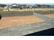 Large backyard space ready for landscaping, enclosed with block fencing and desert views at 7216 E Blissful Breeze Ln, San Tan Valley, AZ 85143