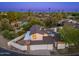 Beautiful aerial view of a home with mature landscaping, pool, and fenced yard at 7223 N 14Th St, Phoenix, AZ 85020