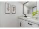 Well-lit bathroom features a sleek vanity with modern fixtures and decorative accents at 7223 N 14Th St, Phoenix, AZ 85020