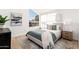 Bedroom with neutral decor, a large window for natural light, and stylish furnishings at 7223 N 14Th St, Phoenix, AZ 85020