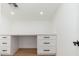Bright desk area with modern white cabinets and drawers under the countertop, great for an office or study space at 7223 N 14Th St, Phoenix, AZ 85020