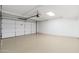 Clean, spacious garage with white walls and epoxy floors providing lots of storage at 7223 N 14Th St, Phoenix, AZ 85020