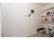 The garage with built-in storage shelves and a clean, organized space for your vehicle or hobbies at 7223 N 14Th St, Phoenix, AZ 85020