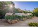 Charming backyard garden with raised garden beds in a sunny setting at 7223 N 14Th St, Phoenix, AZ 85020