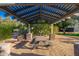 Inviting outdoor area featuring a shaded pergola, perfect for relaxing and enjoying the community's natural surroundings at 7223 N 14Th St, Phoenix, AZ 85020