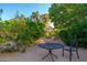 Cozy outdoor seating area surrounded by lush landscaping offering a private and tranquil space for residents at 7223 N 14Th St, Phoenix, AZ 85020