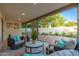 Cozy outdoor patio area with comfortable seating and well-manicured backyard at 7223 N 14Th St, Phoenix, AZ 85020