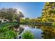Sunlit pond features mature trees and fountain adding beauty to the community at 7223 N 14Th St, Phoenix, AZ 85020