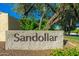 Elegant stone sign with 'Sandollar' prominently displayed, welcoming residents and guests to this beautiful community at 7223 N 14Th St, Phoenix, AZ 85020