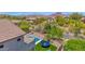 Wonderful backyard featuring a pool, artificial turf, and views of the neighborhood at 7260 E Tasman St, Mesa, AZ 85207