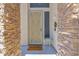 Charming front entrance featuring decorative door with stonework pillars and a welcome mat at 7260 E Tasman St, Mesa, AZ 85207