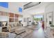 Bright and airy living room offering comfortable seating and a view of the backyard at 7260 E Tasman St, Mesa, AZ 85207
