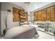 Bright treatment room with modern equipment, wood shutters and neutral decor at 7260 E Tasman St, Mesa, AZ 85207