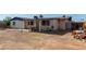 Backyard patio area with a dining set perfect for outdoor meals at 8339 W Devonshire Ave, Phoenix, AZ 85037