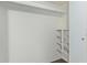 Walk-in closet featuring built-in shelving for optimal storage and organization at 8339 W Devonshire Ave, Phoenix, AZ 85037