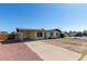 Charming single-story home with desert landscaping and covered carport at 8339 W Devonshire Ave, Phoenix, AZ 85037