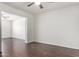 Inviting living room with wood floors and neutral paint provides comfort at 8339 W Devonshire Ave, Phoenix, AZ 85037