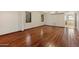 The vacant bedroom features hardwood floors, views of the grounds, and recessed lighting at 9349 E Calle De Valle Dr, Scottsdale, AZ 85255