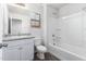 Bathroom featuring a vanity, a toilet, and a bathtub at 935 E Agua Fria Ln, Avondale, AZ 85323